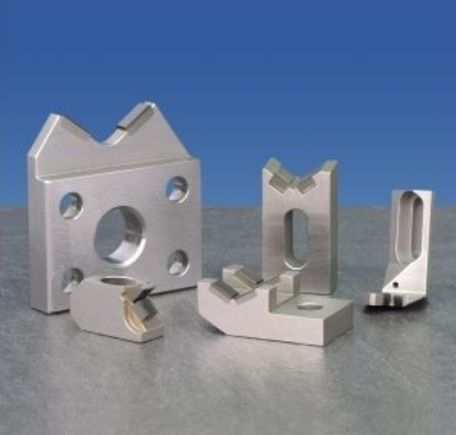 Polycrystalline diamond support block for bearing grinding